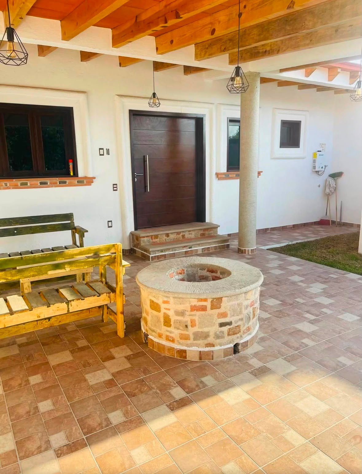 Terraza con fogatero en casa de descanso en Tequisquiapan